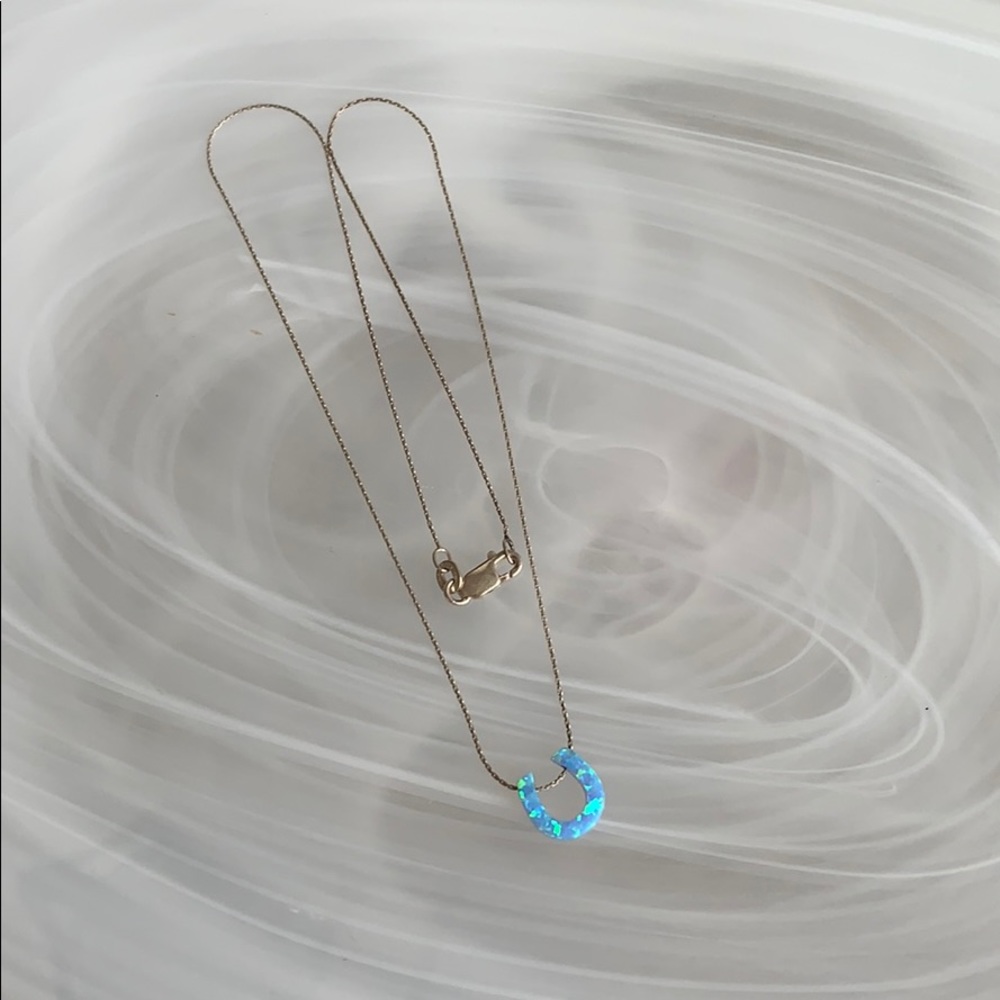 Opal horseshoe on sterling silver necklace